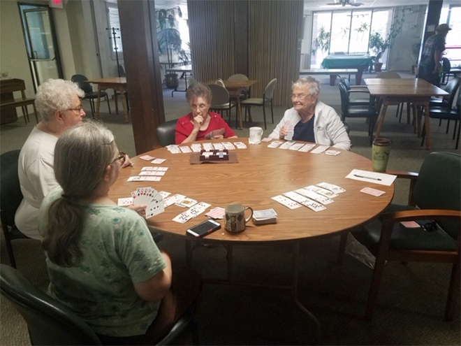 Adult Center Card Players